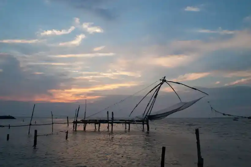 Fort Kochi waterfront glowing in the evening light